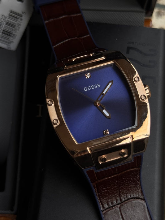 Stylish GUESSS Blue Dial Men’s Analog Watch – Gold Case with Brown Leather