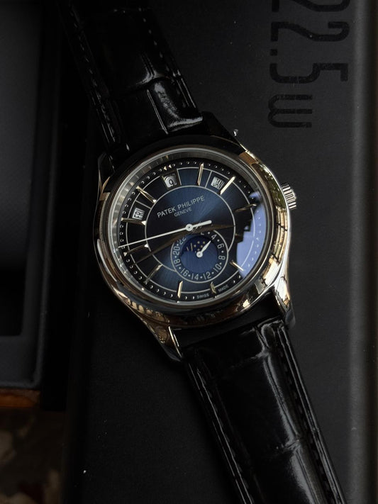Patekk Philippee Annual Calendar – Blue Sunburst Dial | 18K White Gold | Moonphase Display
