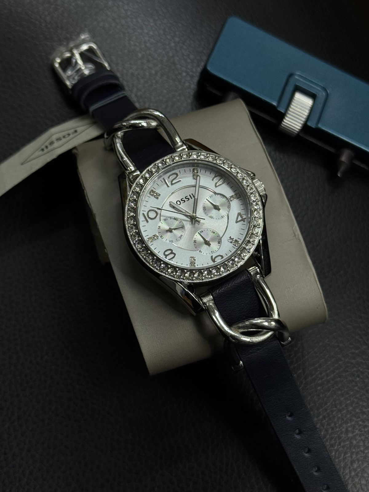 Fossill Ladies Multifunction Watch – White Dial – Crystal Bezel – Navy Leather Strap